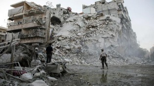 Los últimos rebeldes que resistían en Homs comienzan a abandonar la ciudad