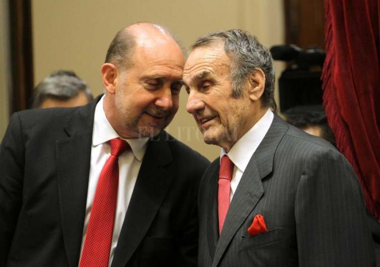 Reutemann y Perotti a favor Clarín y La Nación