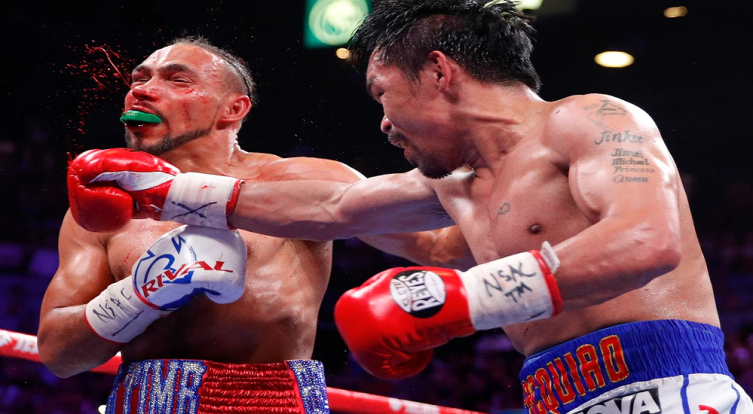 Pacquiao le sacó el invicto de Thurman en decisión dividida y unificó el título mundial