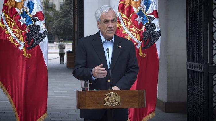Piñera promulgó una ley contra el femicidio 