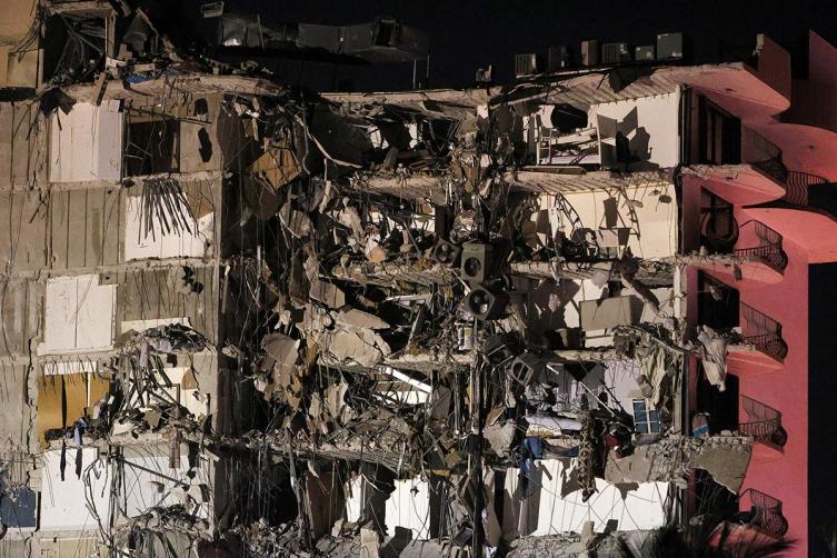 Buscan a nueve argentinos entre 99 desaparecidos por el derrumbe