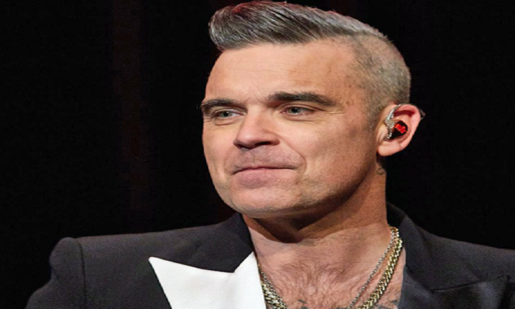 Robbie Williams lanza un nuevo álbum con sus grandes éxitos